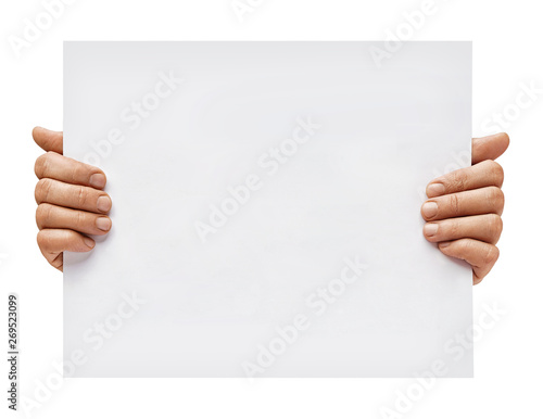 Copy space for your text. Man's hands holding empty board isolated on white background. Close up. High resolution