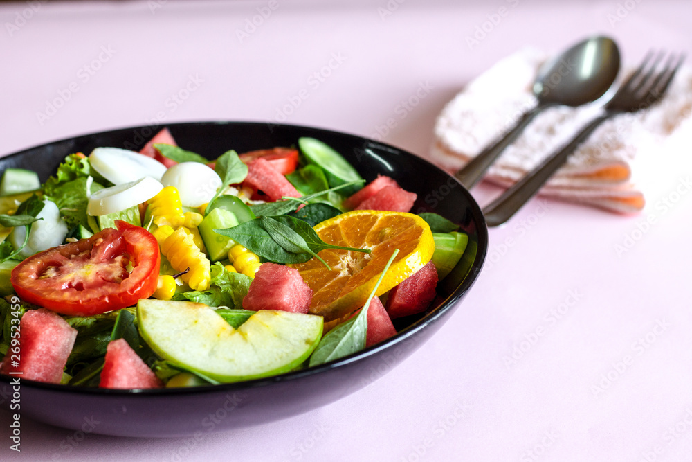 Selective focus Salmon Fresh green Salad with spinach, cherry tomatoes,baby spinach, Concept for a tasty and healthy meal. Dark stone background. Top view. Close up. Selective focus Salmon Fresh green Salad with spinach, cherry tomatoes,baby spinach, Concept for a tasty and healthy meal. Dark stone background. Top view. Close up.