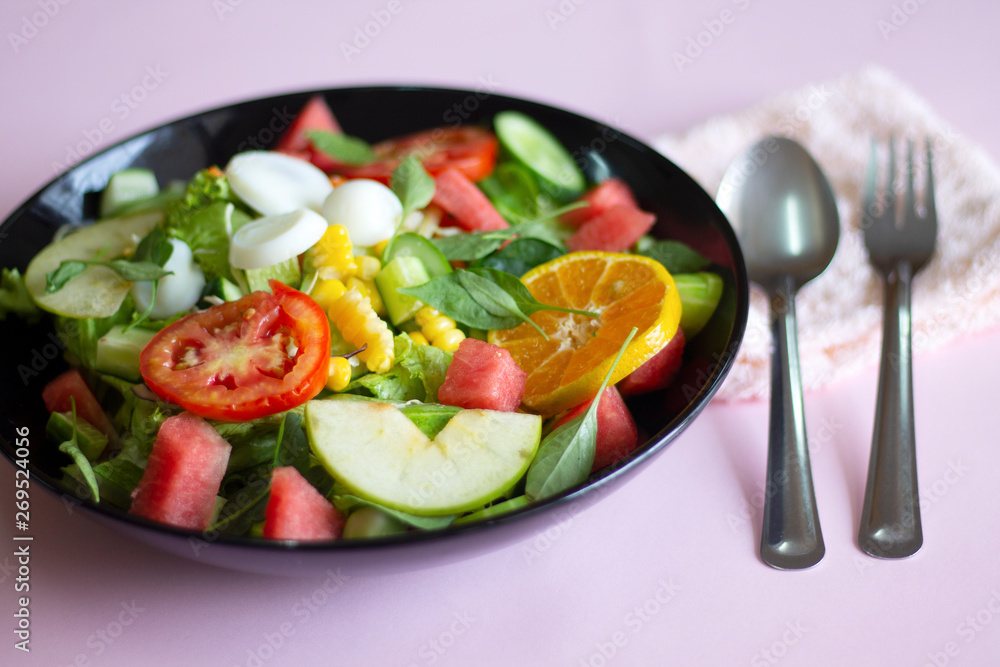 Selective focus Salmon Fresh green Salad with spinach, cherry tomatoes,baby spinach, Concept for a tasty and healthy meal. Dark stone background. Top view. Close up. Selective focus Salmon Fresh green Salad with spinach, cherry tomatoes,baby spinach, Concept for a tasty and healthy meal. Dark stone background. Top view. Close up.