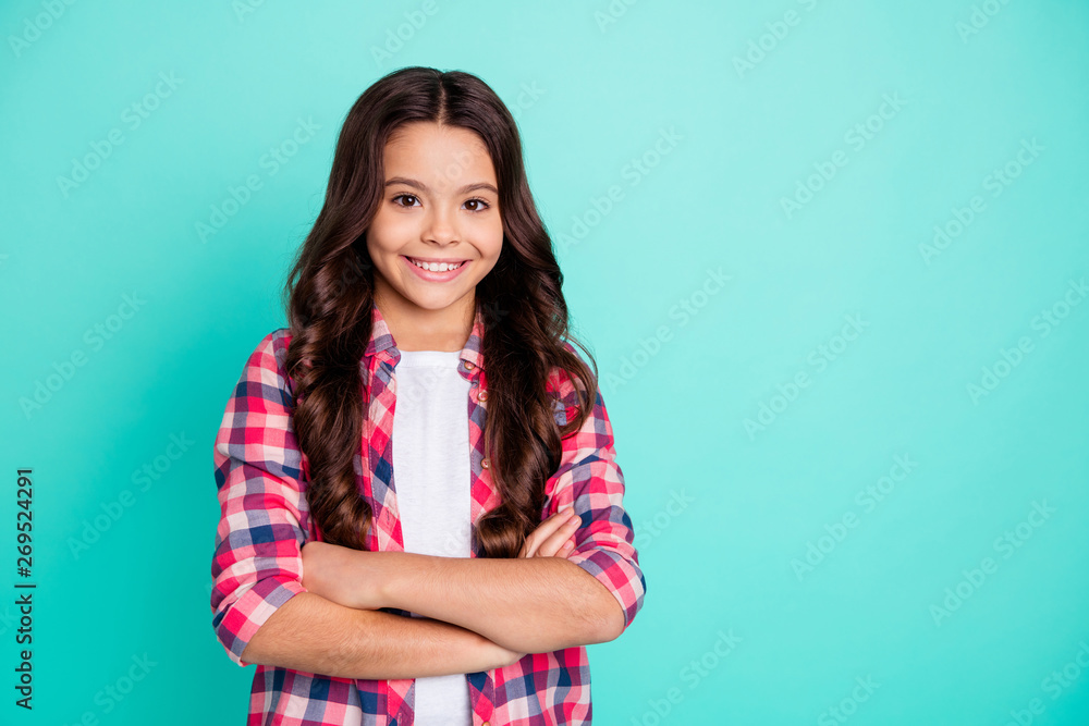 Obraz premium Portrait of attractive gorgeous little lady true leader leadership feel independent smart optimistic content interested isolated dressed bright plaid outfit green background