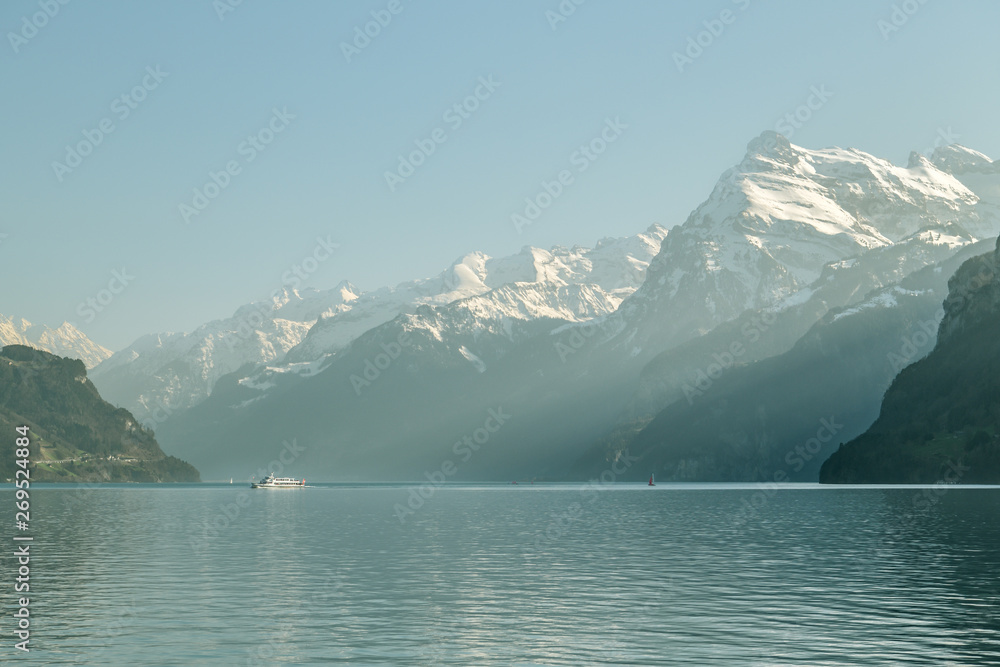 Cruise ship sailing on Lake Luzern in beautiful Alpine scenery near Brunnen, Switzerland