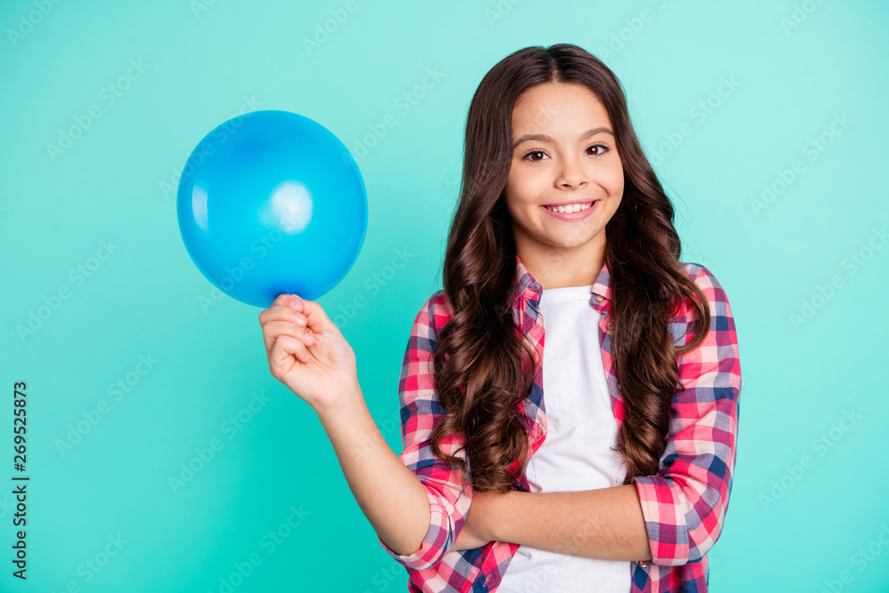 Portrait of her she nice attractive cute charming lovely cheerful wavy-haired girl in checked shirt holding in hand festive ball isolated on bright vivid shine green blue turquoise background Portrait of her she nice attractive cute charming lovely cheerful wavy-haired girl in checked shirt holding in hand festive ball isolated on bright vivid shine green blue turquoise background