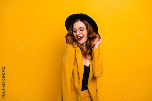 Portrait of her she nice-looking charming cute attractive lovely lovable fascinating fashionable chic cheery wavy-haired lady having fun enjoying time isolated on bright vivid shine orange background