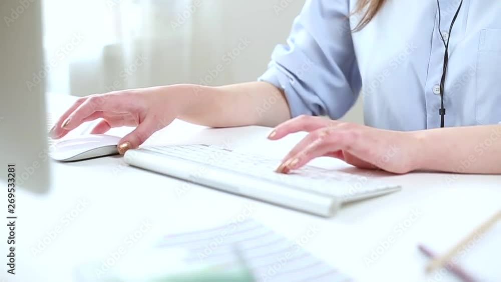 Hands of female call center operator on keyboard. Hands of female call center operator on keyboard.