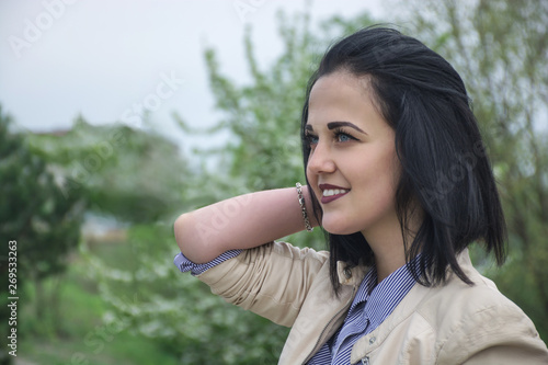 Wallpaper Mural Magnificent passionate young brunette woman with perfect skin. Presenting your product. Expressive facial expressions. Copy space. Her hands near her face.  Torontodigital.ca