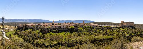 Pedraza, Castilla Y Leon, Spain: panorama of Pedraza village from Mirador the Tungueras, with the Sierra de Guadarrama behind. Pedraza is one of the best preserved medieval villages of Spain