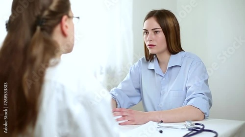 Wallpaper Mural A female patient consults with a doctor in a clinic office. The concept of gynecology.  Torontodigital.ca