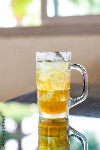Yellow water in herbal glass