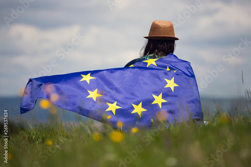 Woman with EU flag.