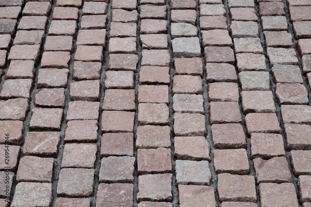 Freshly laid natural stone pavement Freshly laid natural stone pavement