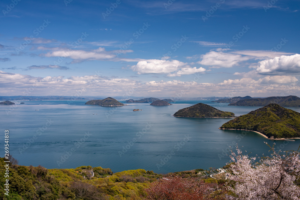 Cherry blossom with blue sky, sea and islands Cherry blossom with blue sky, sea and islands