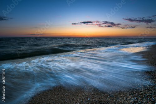 sunset view of the sea. long exposure, waves fuzzy