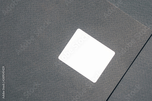 Empty card label or sticker mockup blank on the grey textured background.