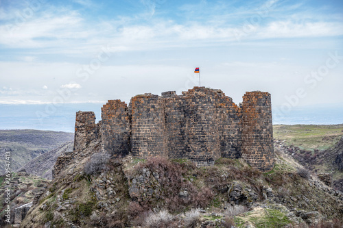 Amberd , 7th-century fortress located on the slopes of Mount Aragats at the confluence of the Arkashen and Amberd rivers in the province of Aragatsotn, Armenia .  fortress in the clouds photo