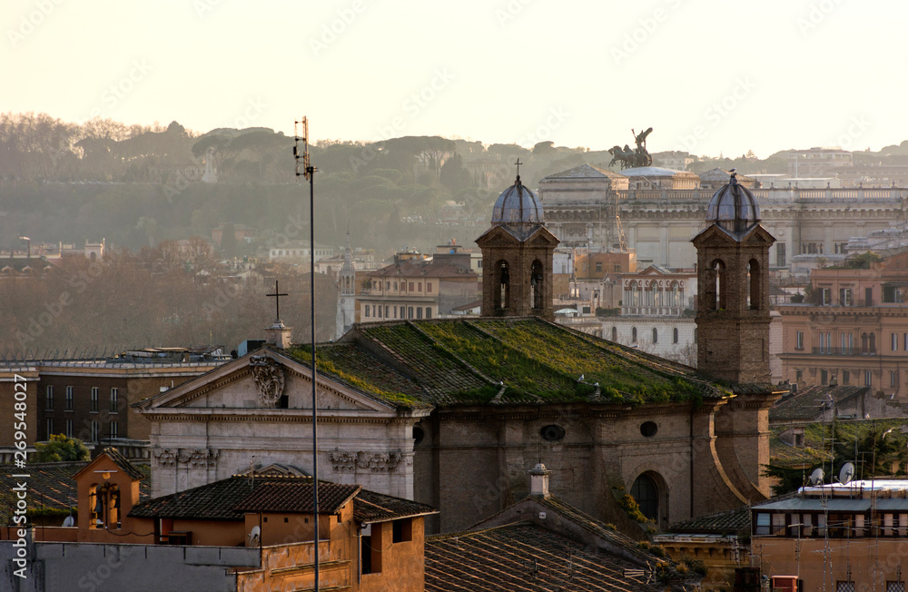 roofs of Rome at sunset, city view