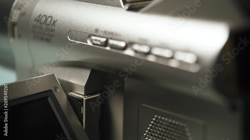 Close up of a video camera camcorder buttons, rack focus. Studio product shot photo