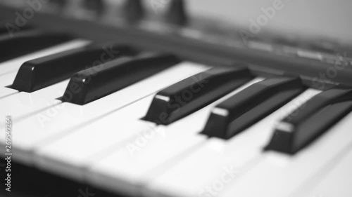 Wallpaper Mural Close up pan across the black and white keys of an electronic keyboard piano Torontodigital.ca