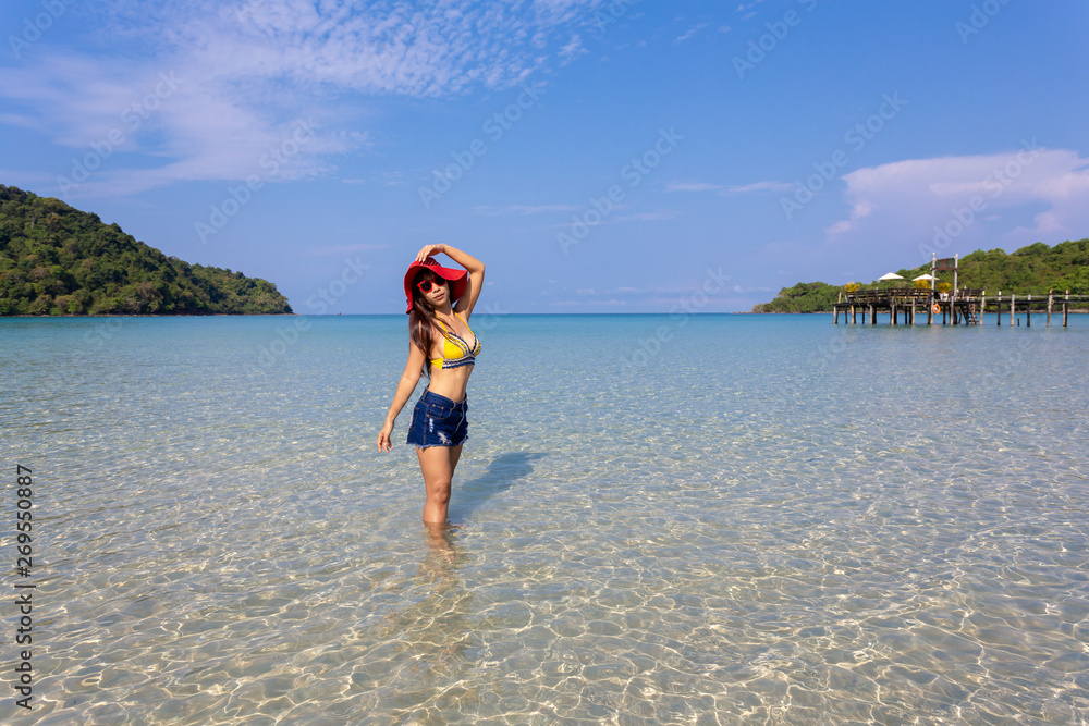 Summer travel asian young woman on the beach at Sea ,koh kood island Thailand Summer travel asian young woman on the beach at Sea ,koh kood island Thailand