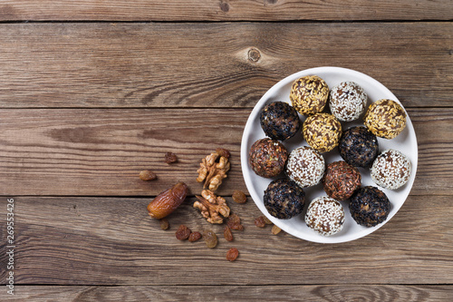Energy balls made from a natural mixture of dried fruits and nuts(dates,dried apricots,raisins,walnuts,prunes). Healthy diet.