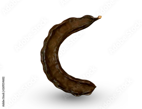 Close-up one dried brown carob fruit isolated on white background. Natural and healthy food ingredient. photo