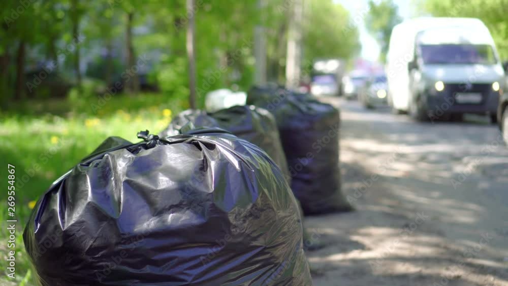 bags of garbage by the road