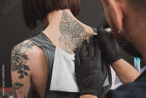 Faceless woman with tattoo of bra on arm · Free Stock Photo