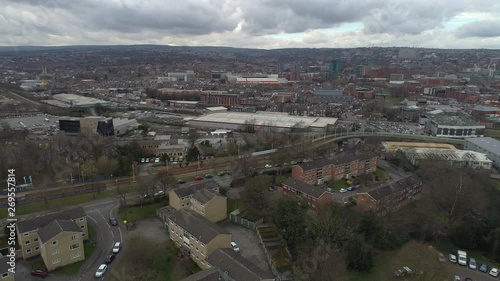 Aerial drone of housing in Sheffield city centre with tram photo