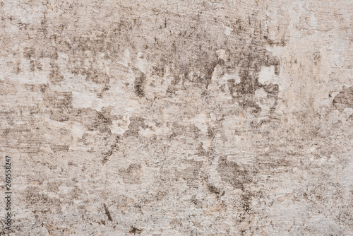 Texture, wall, concrete, it can be used as a background. Wall fragment with scratches and cracks © chernikovatv