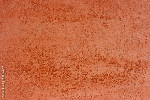 abstract aged red limestone like plaster texture for design purposes.