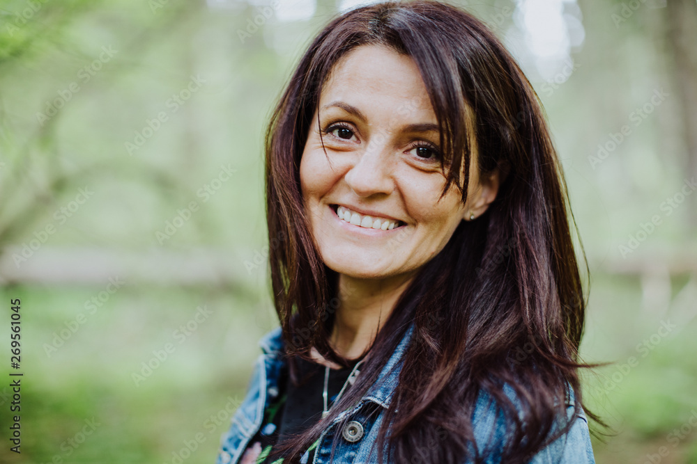 nice mature woman walking in the forest nice mature woman walking in the forest