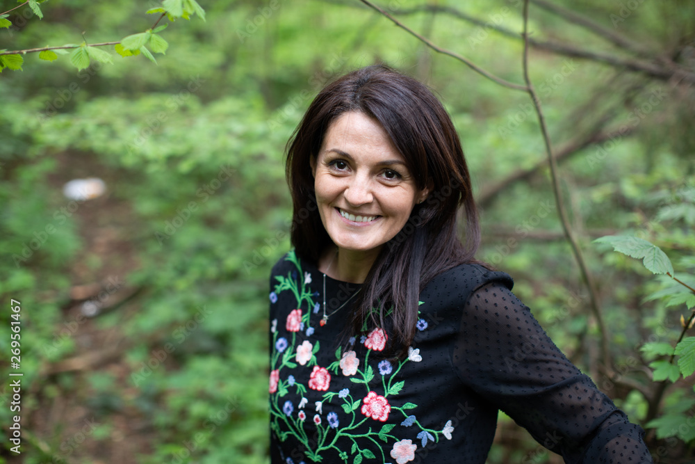 Nice mature woman in the forest Nice mature woman in the forest