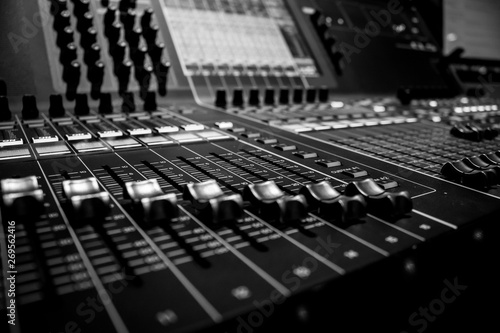 Closeup view of Faders on Professional digital Audio Sound  mixing control Console
