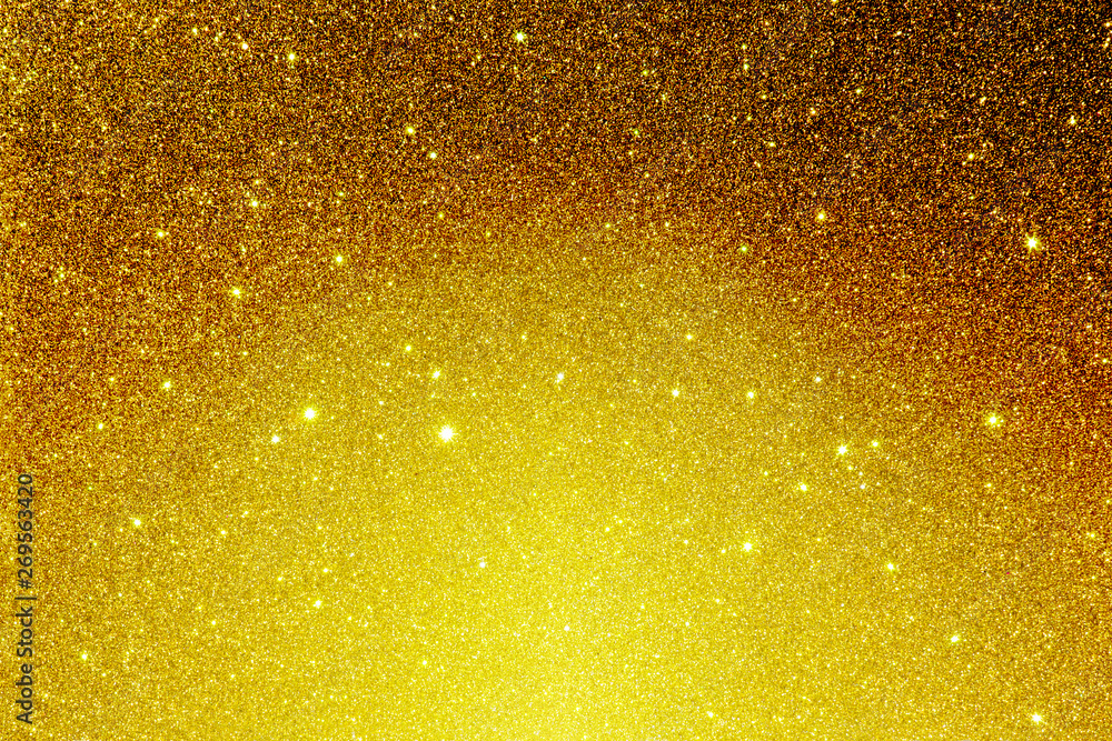 Gold texture. Gold holiday background. Luxury brilliant shine