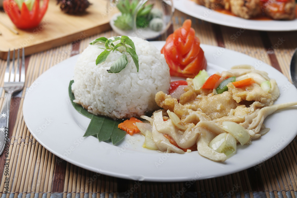 fillet fried chicken with sauteed mushrooms served with rice fillet fried chicken with sauteed mushrooms served with rice