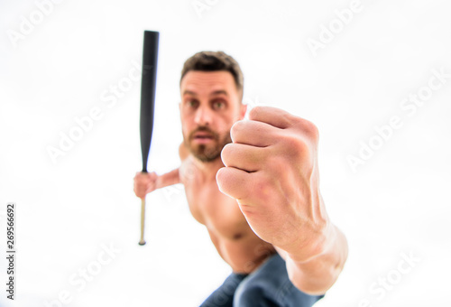 Ready to fight. see my fist. man with baseball bat. i am a criminal. Hooligan man hits the bat. Bandit gang and conflict. aggression and anger. unshaven muscular man fighting. full of energy