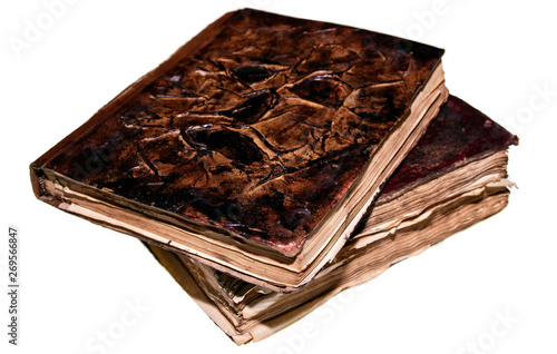 Old magical books isolated on white background
