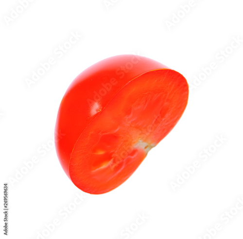 Cut red cherry tomato on white background