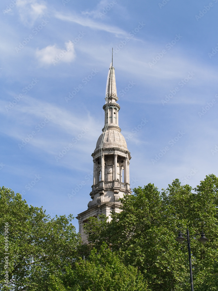 View of the tower of the Shoreditch Church St Leonards over the trees