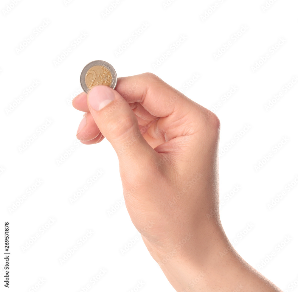 Man holding coin in hand on white background, closeup Man holding coin in hand on white background, closeup