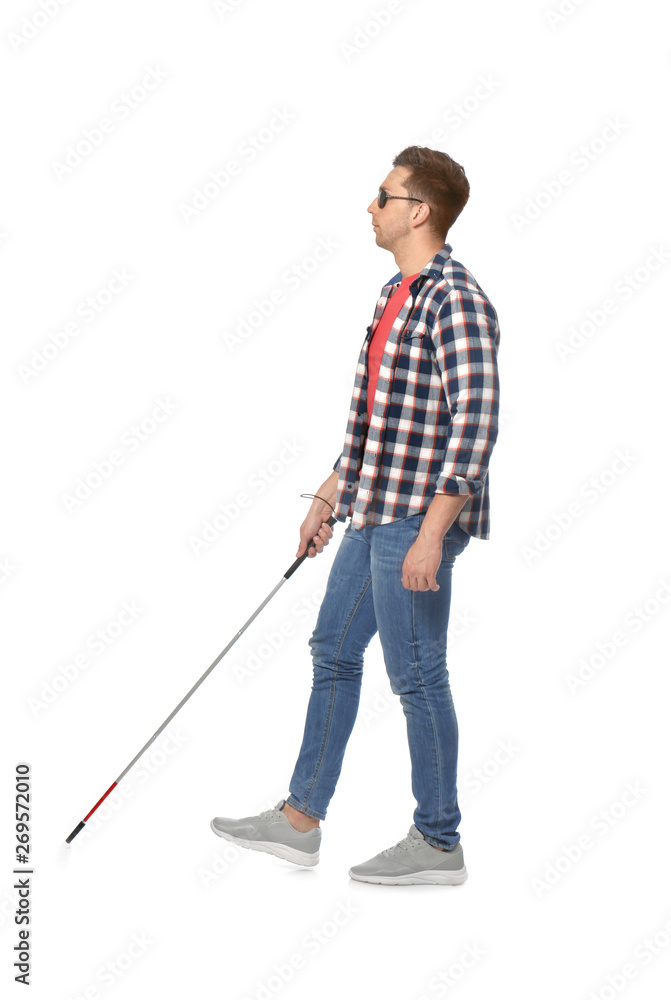 Young blind person with long cane walking on white background Young blind person with long cane walking on white background