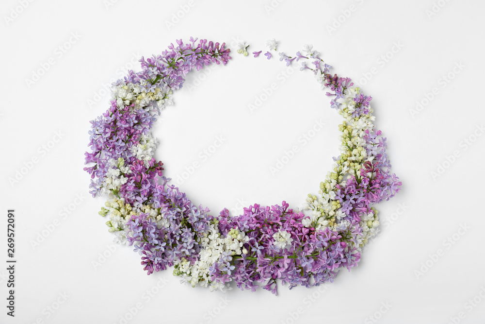 Blossoming lilac flowers on white background, top view. Space for text