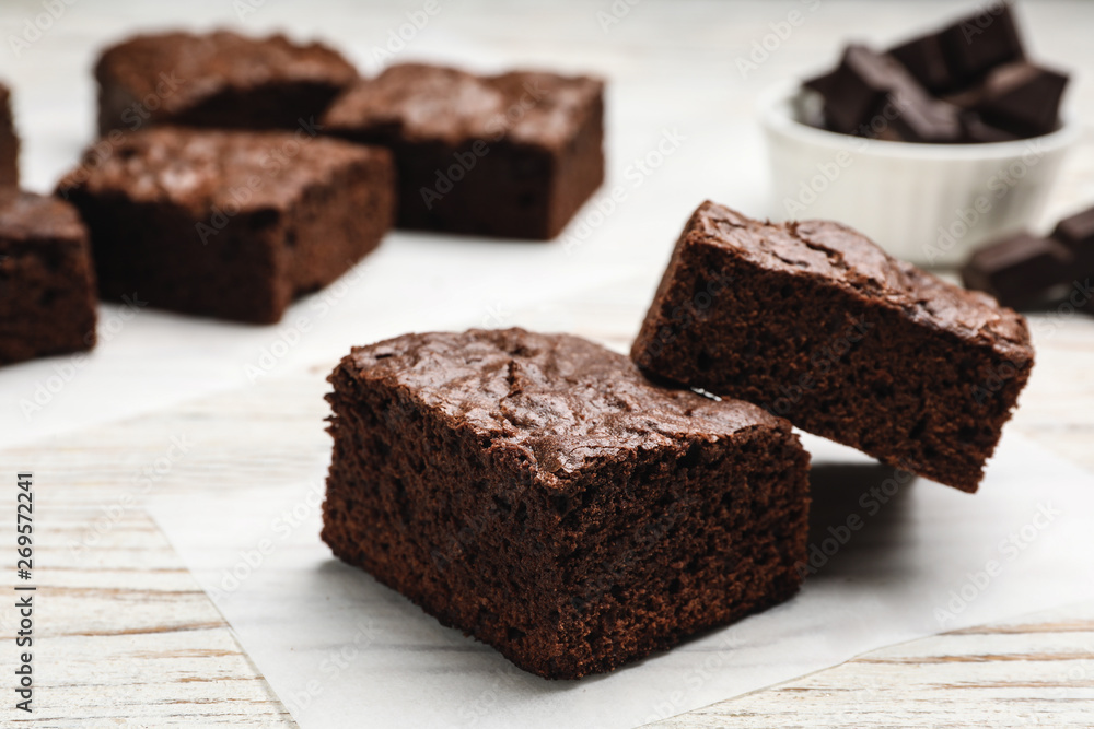 Fresh brownies on table, closeup. Delicious chocolate pie Fresh brownies on table, closeup. Delicious chocolate pie