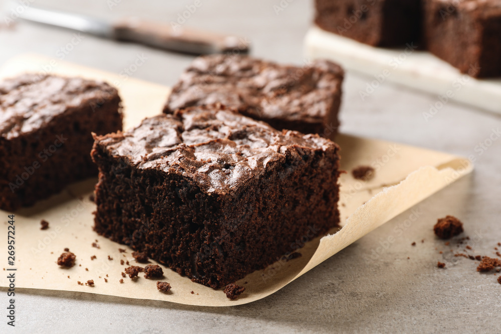 Fresh brownies on table, closeup with space for text. Delicious chocolate pie Fresh brownies on table, closeup with space for text. Delicious chocolate pie