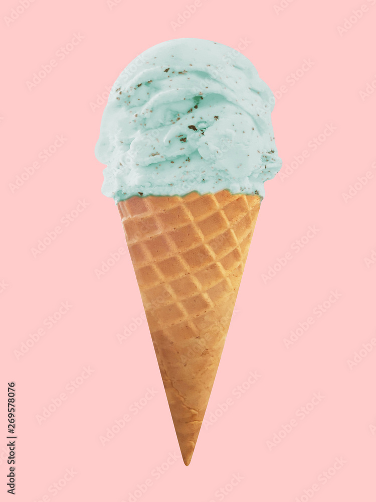 mint chocolate chip ice cream in the cone isolated on pink mint chocolate chip ice cream in the cone isolated on pink