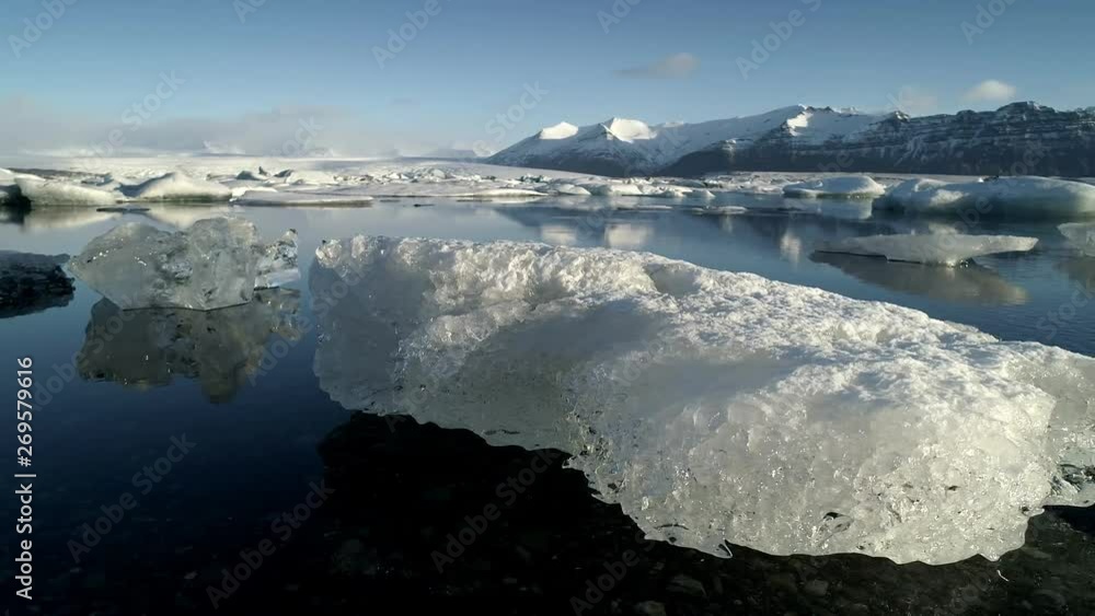 custom made wallpaper toronto digitalFlying above floating Icebergs. Ice from Glacier crystal shining. Ice Lagoon Global warming Explore Iceland.