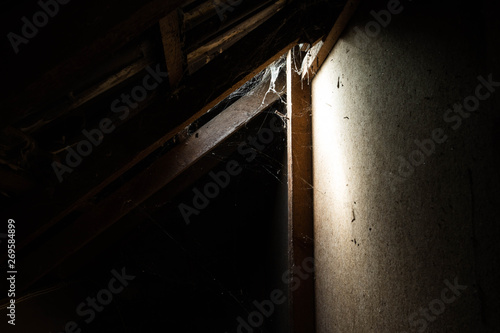 window light in dark old Abandoned Attic