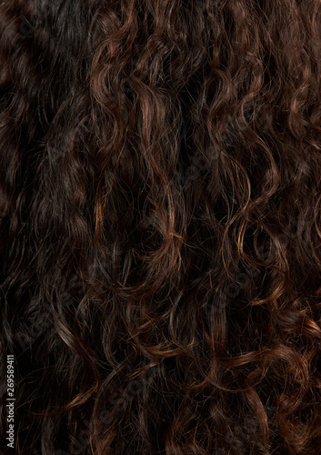 Brown curly hair closeup