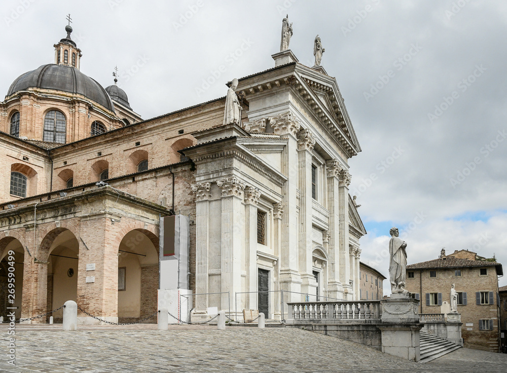 View of the facade and the cupola of the neoclassical Duomo di Urbino, Urbino Cathedral in the Marche region, Italy.