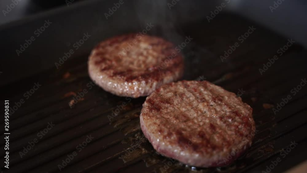 Hamburger cooking. Close up on skillet. Hamburger cooking. Close up on skillet.