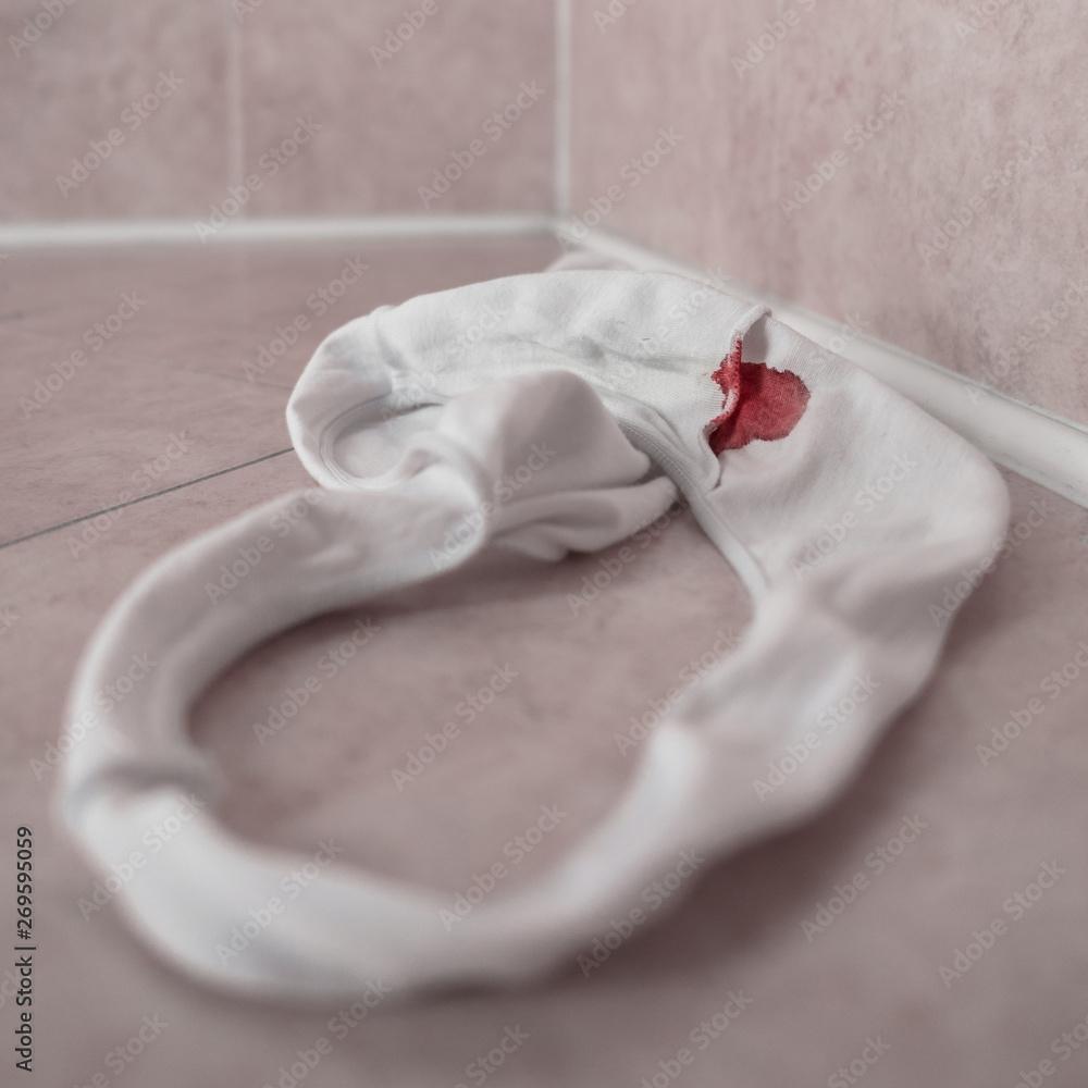 Panties in bloody stain Stock Photo